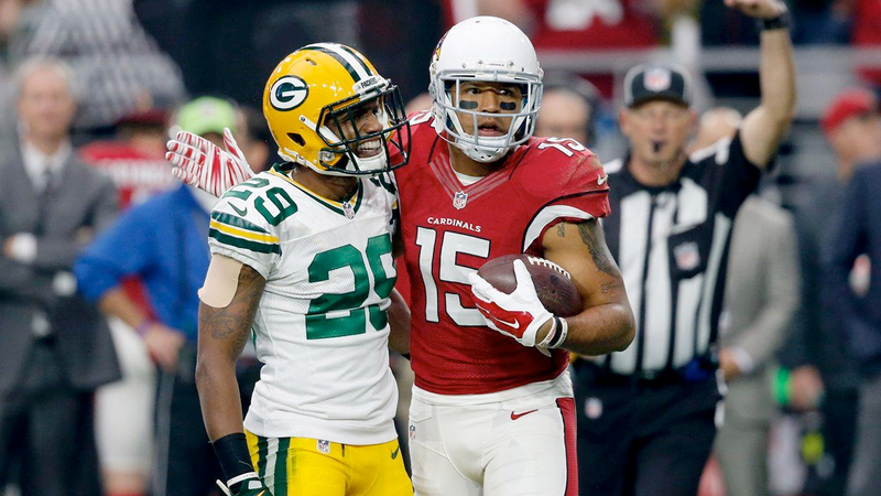 Arizona wide receiver Michael Floyd and Green Bay cornerback Casey Hayward share a moment of loving friendship and tender goodwill during the teams’ Week 16 matchup last month, which Arizona won 38-8. (Photo: Arizona Cardinals)